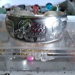 Silvertone bracelet.